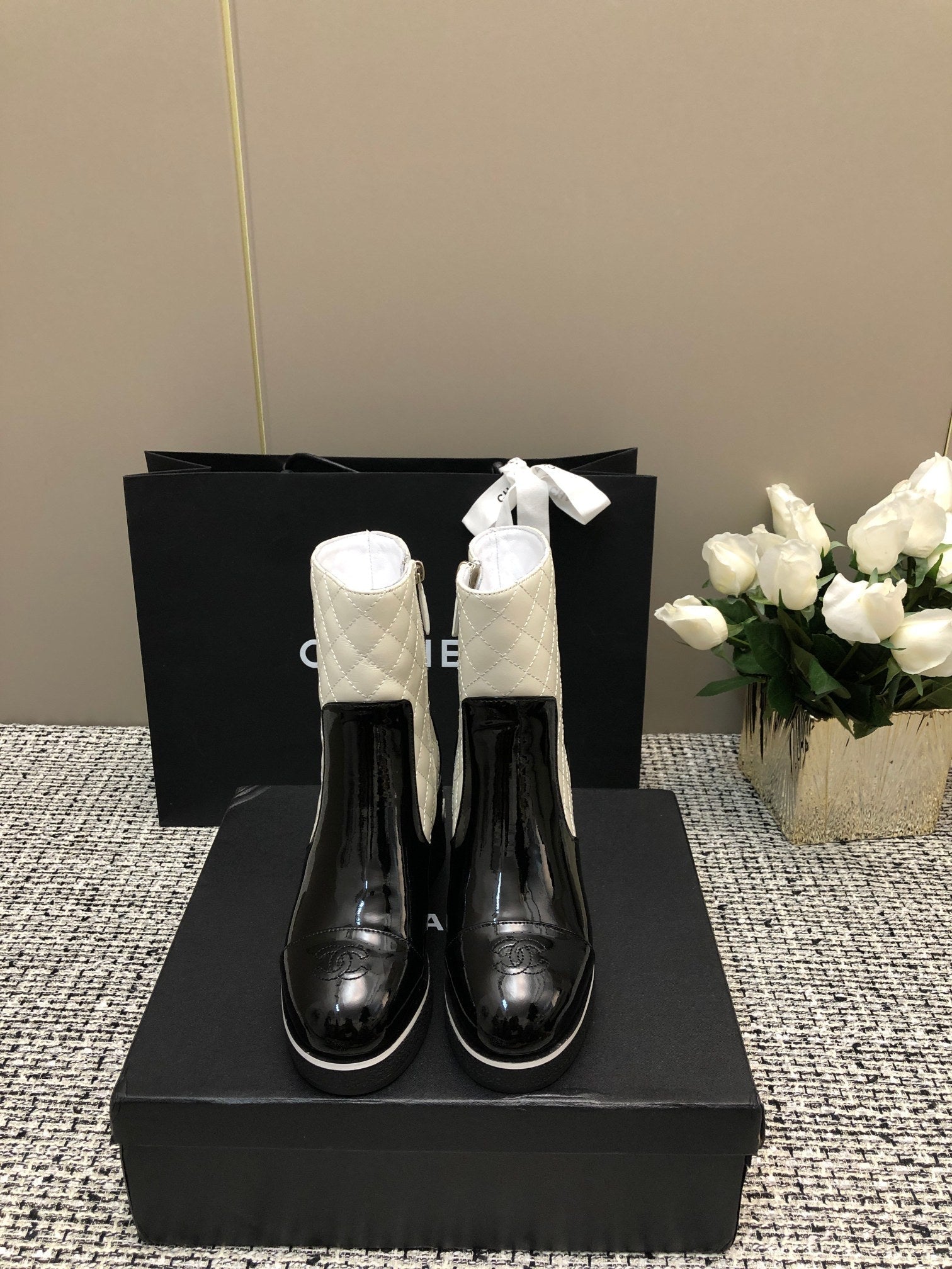 CHANEL ROUND-TOE SHORT BOOTS BLACK MIX WHITE SHEEPSKIN